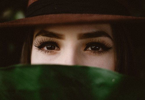 Hiding behind a plant