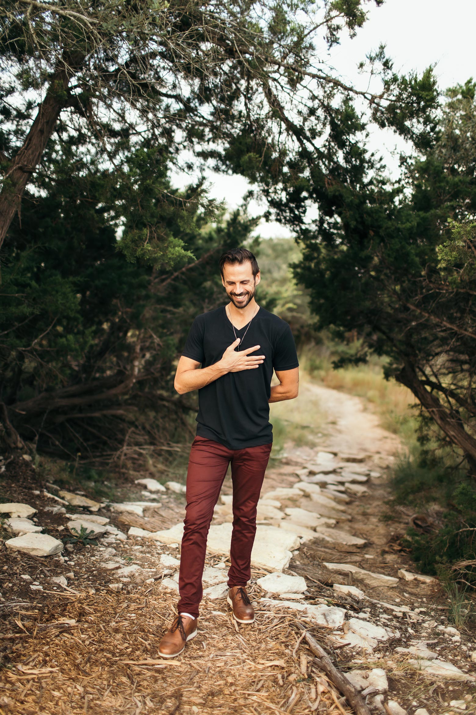 Matt Hogan standing in forest